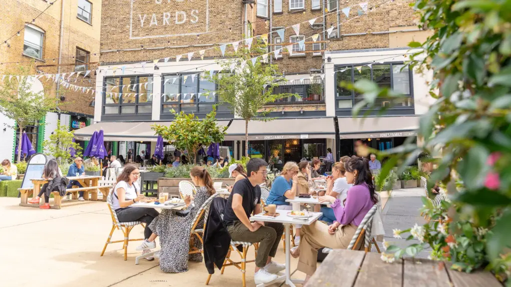 People enjoying Eccleston yard in summer