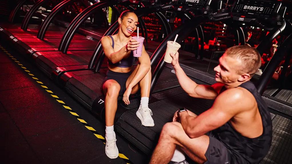 two people working out in a studio