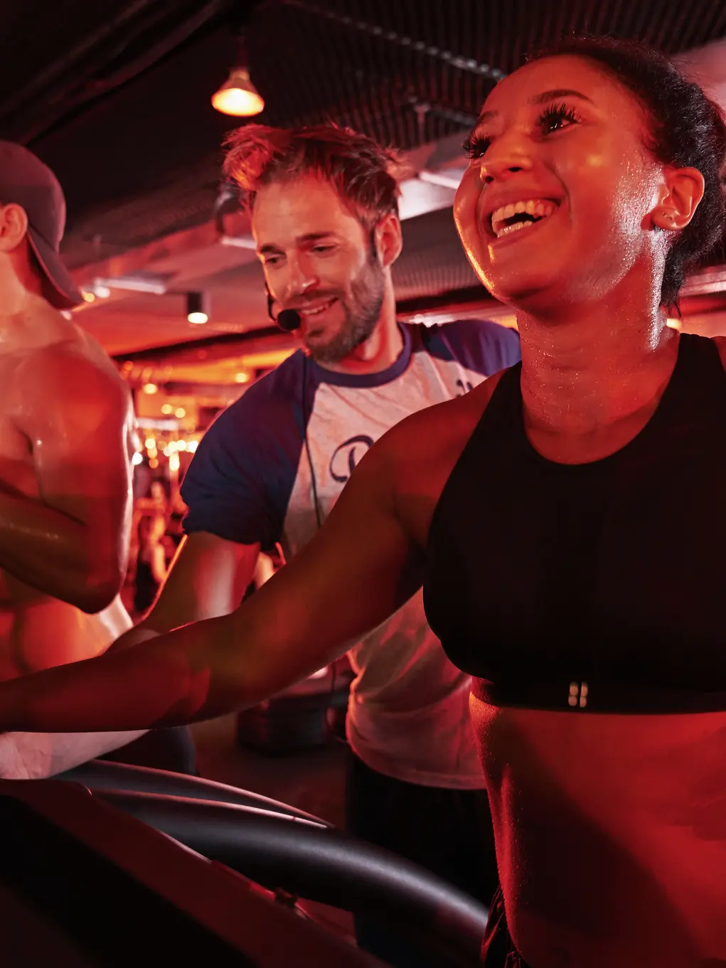 Lady in a gym class on a treadmill