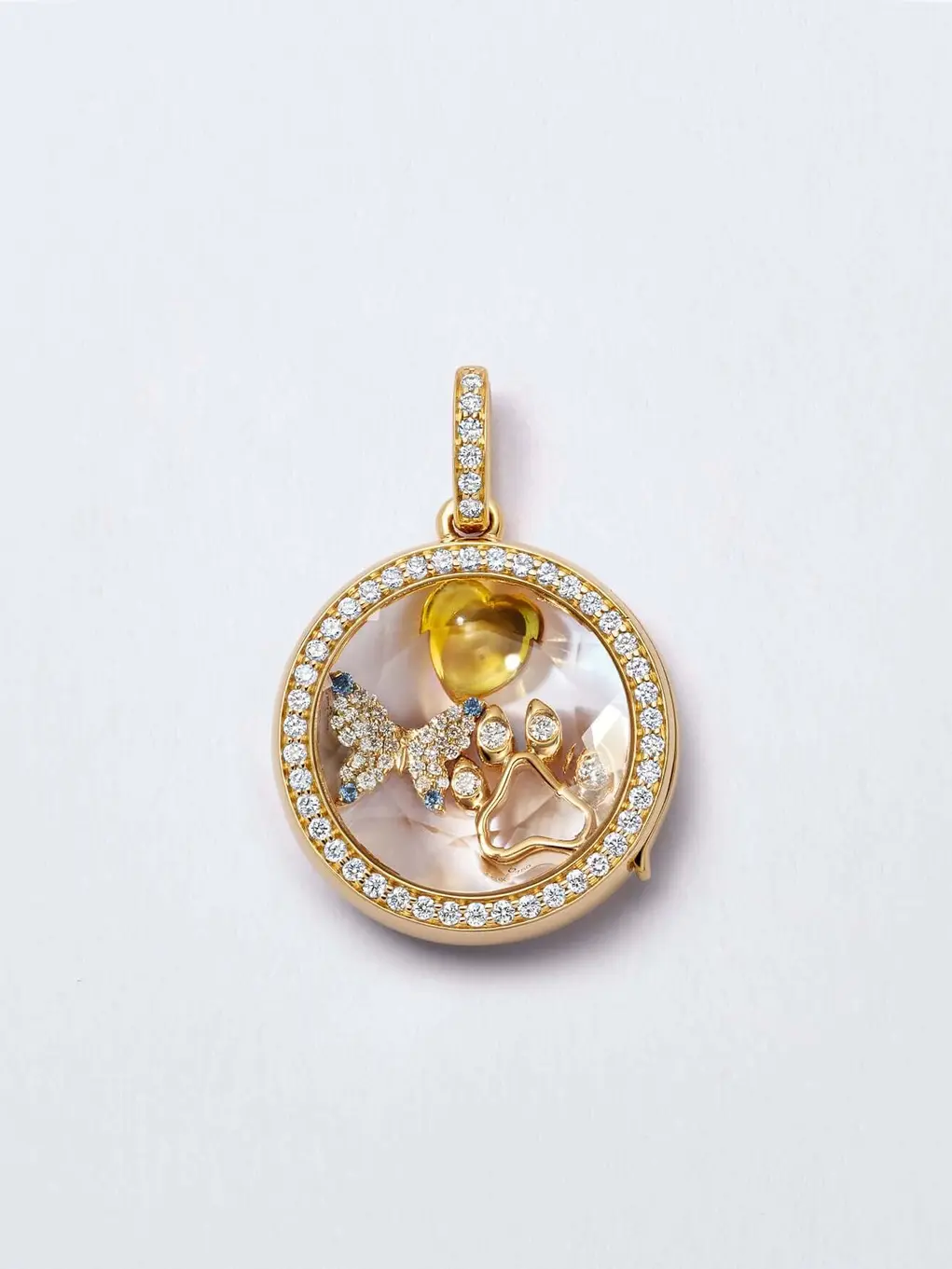 Round diamond and gold locket