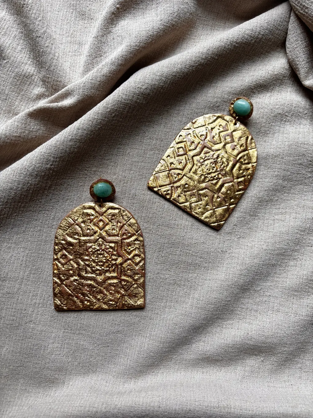 Large gold earrings