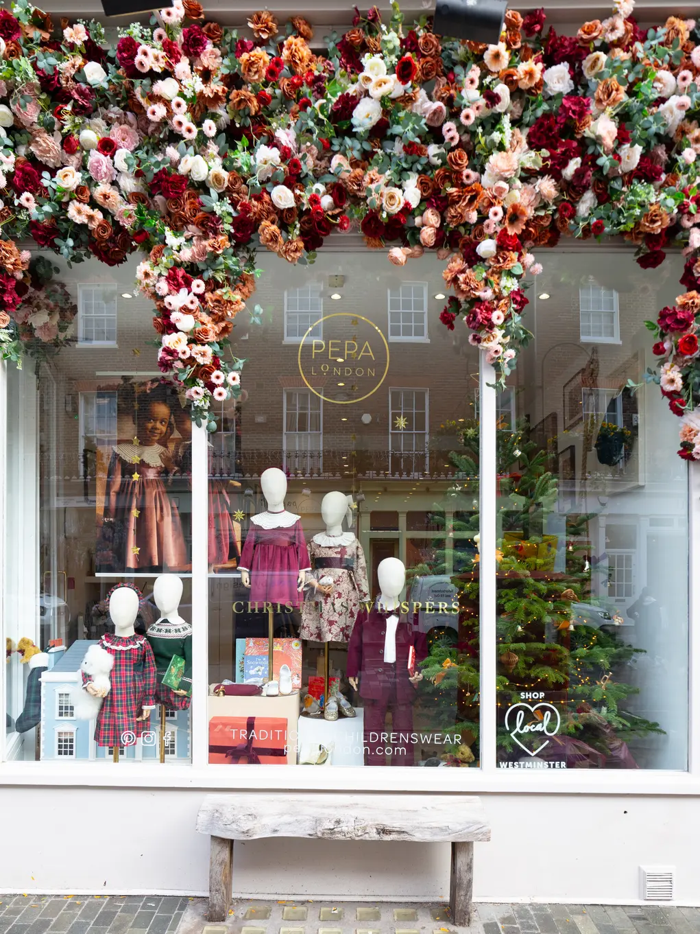 Shopfront of Pepa London with Christmassy display