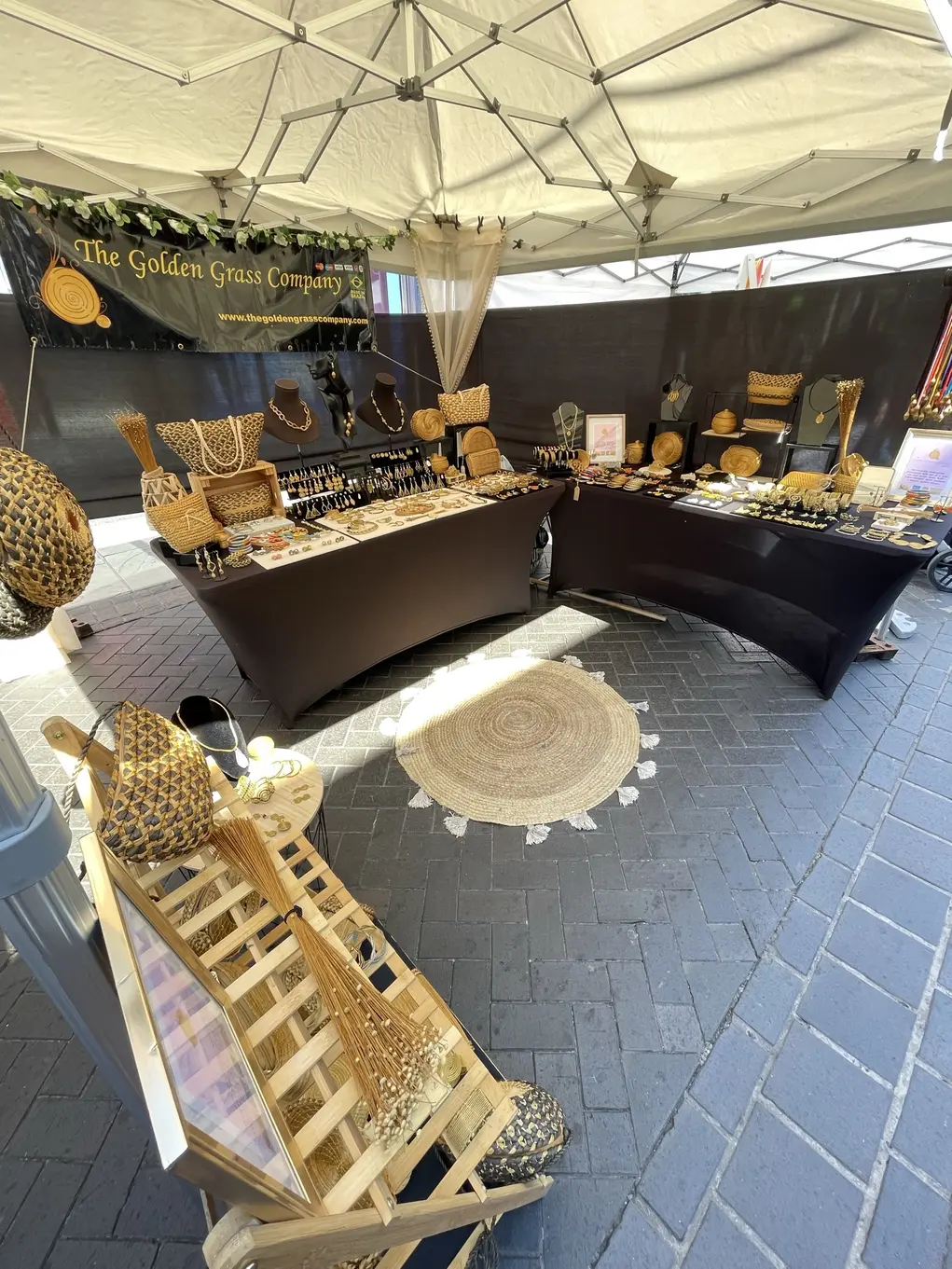 A market stall selling products made of straw