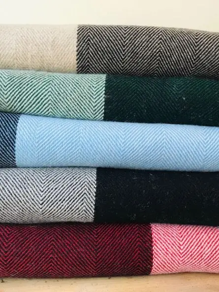 A pile of five scarves
