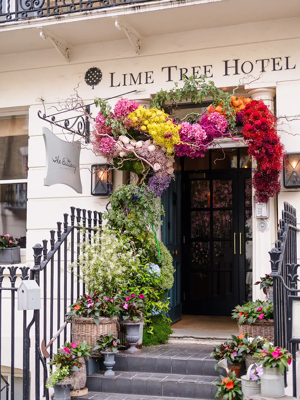 Outside of Lime Tree Hotel with its floral Belgravia in Bloom display