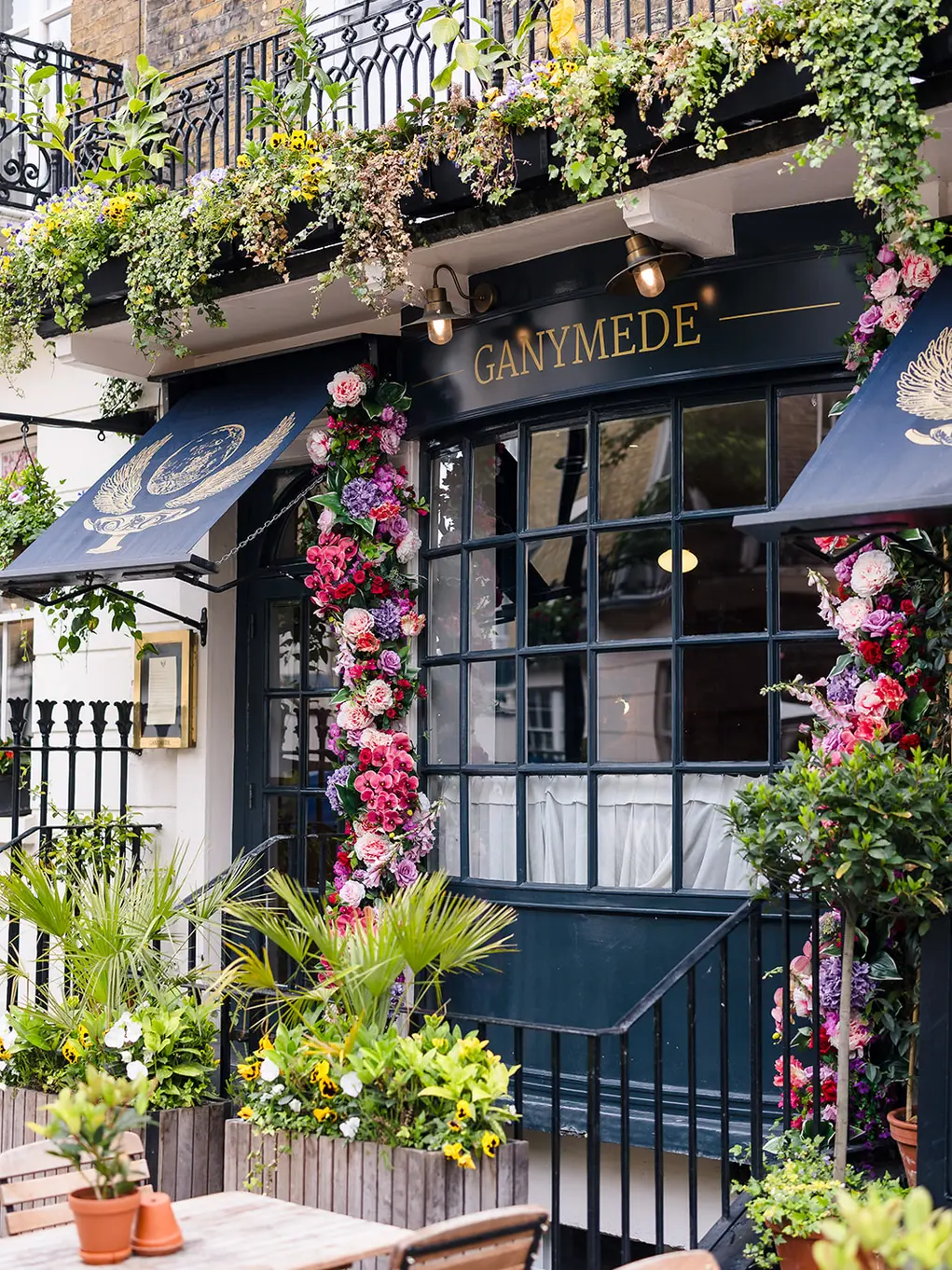 Outside of Ganymede with its floral display for Belgravia in Bloom