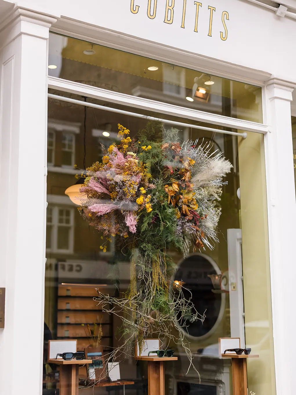 Floral window display of Cubitts for Belgravia in Bloom