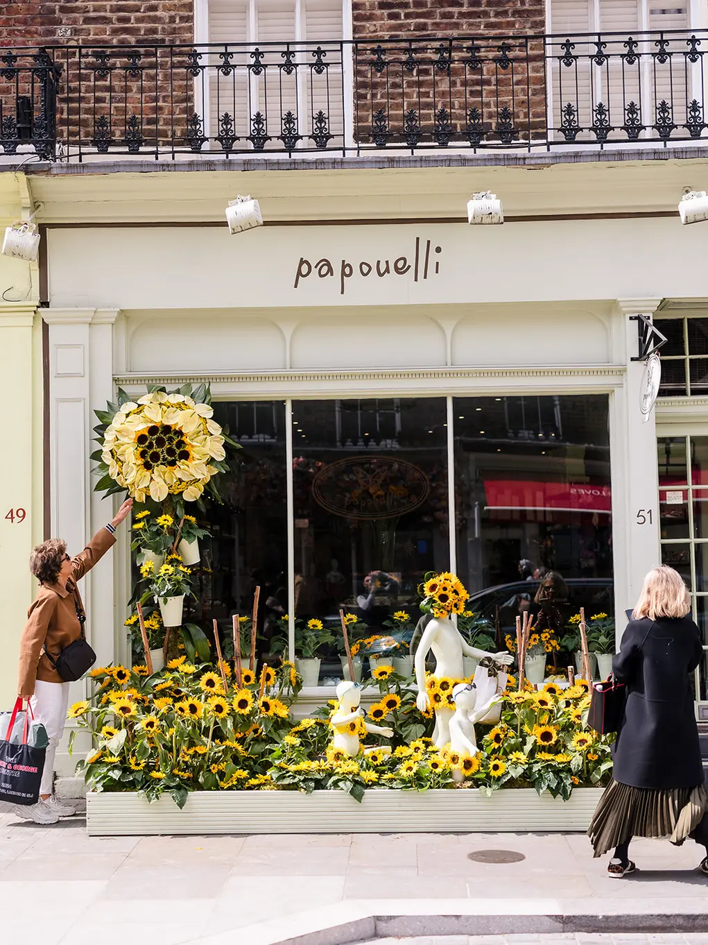 Papouelli with a floral display of sunflowers
