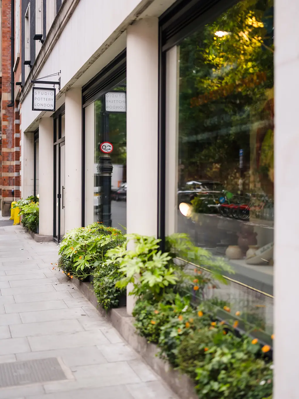 Studio Pottery London with plants outside
