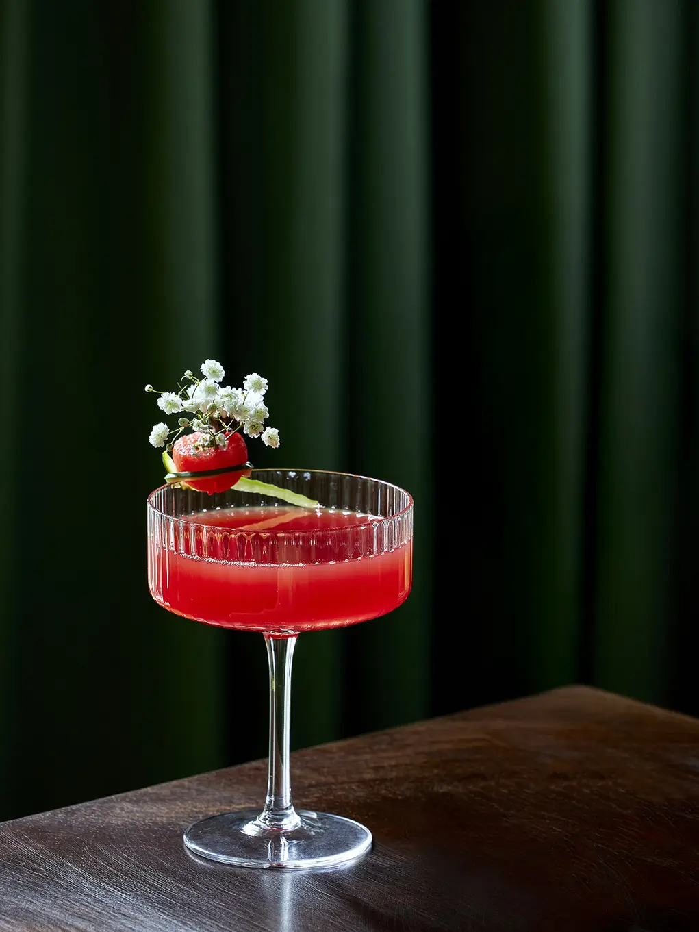 A floral red-coloured cocktail