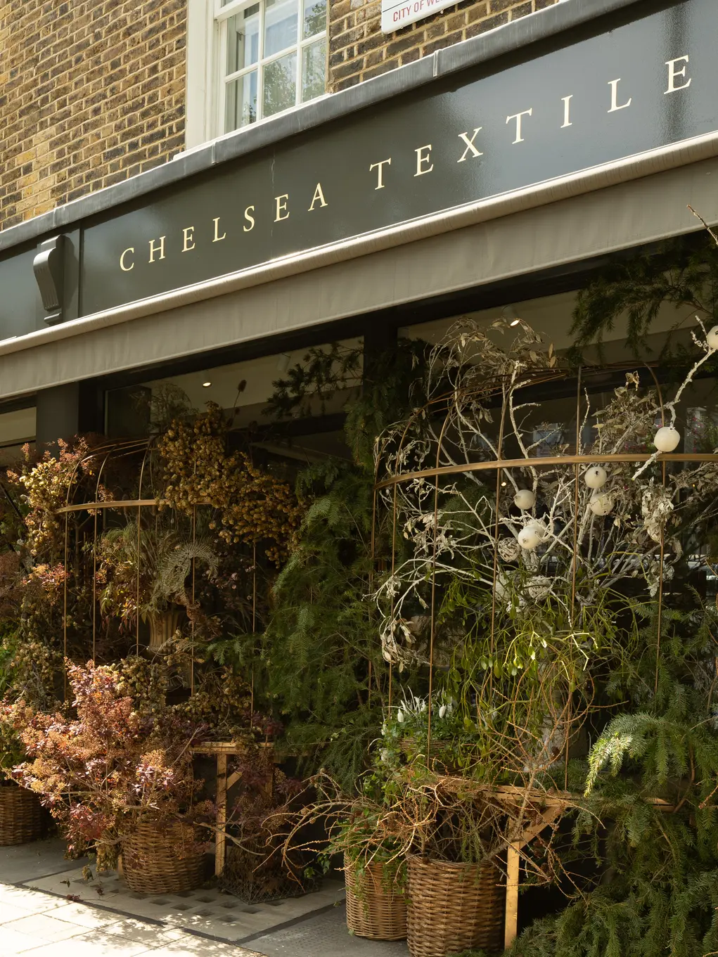 Outside of Chelsea Textiles with its floral display 