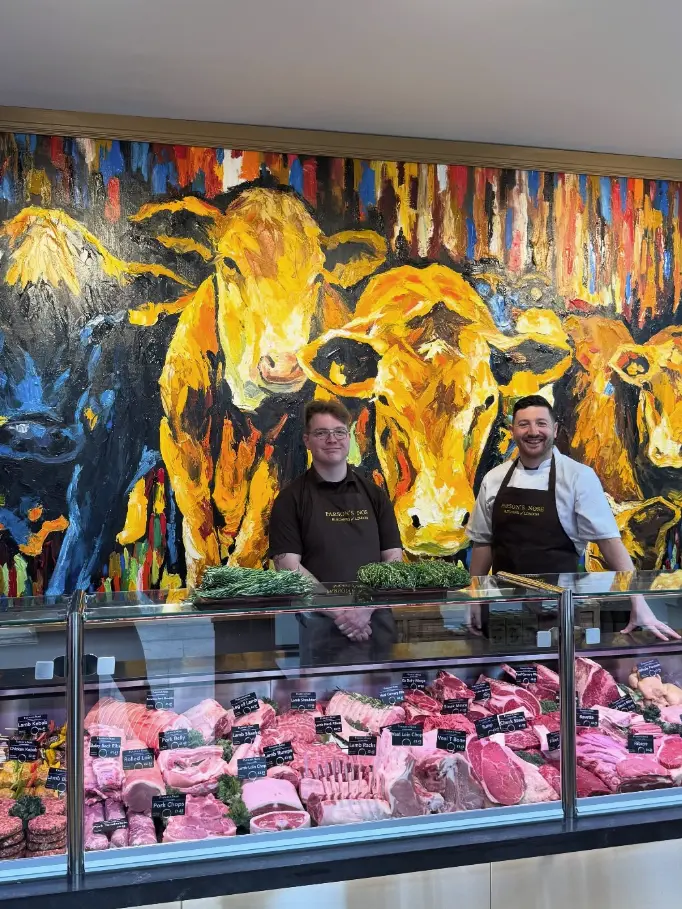 two men in a butchers
