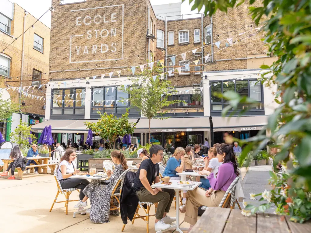 People enjoying Eccleston yard in summer