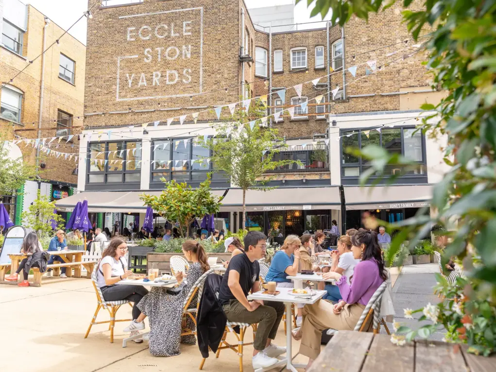 People enjoying Eccleston yard in summer