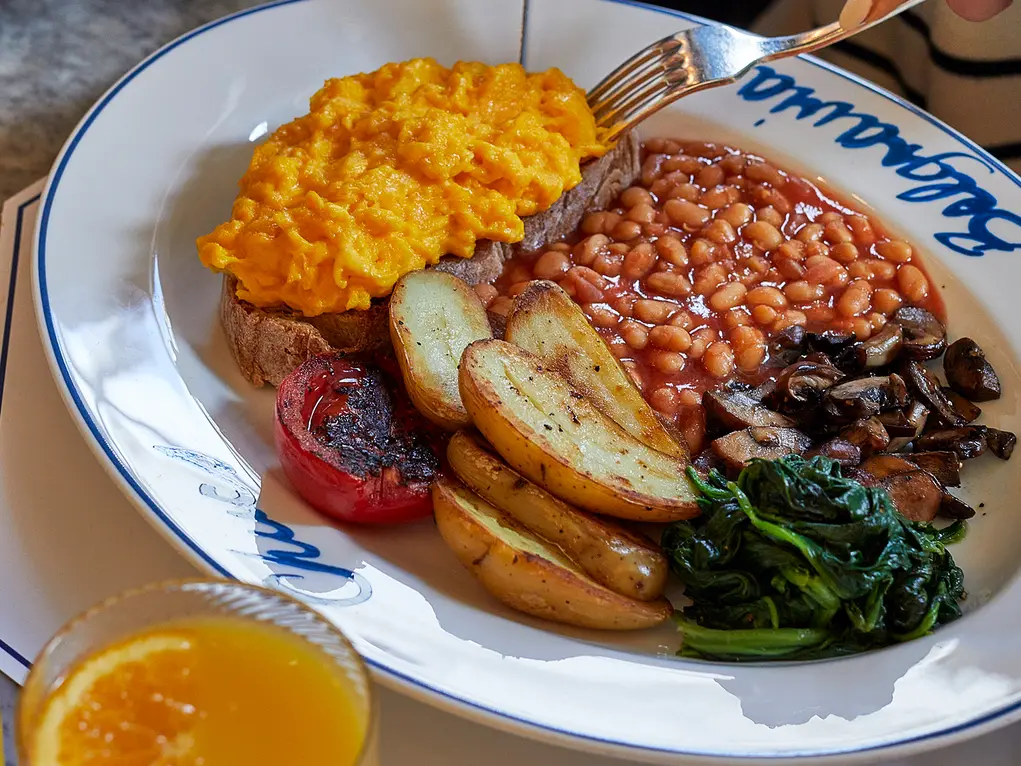A fried breakfast and orange juice