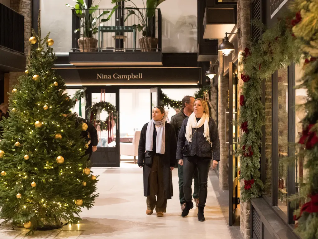 The front of Nina Campbell with a Christmas tree outside