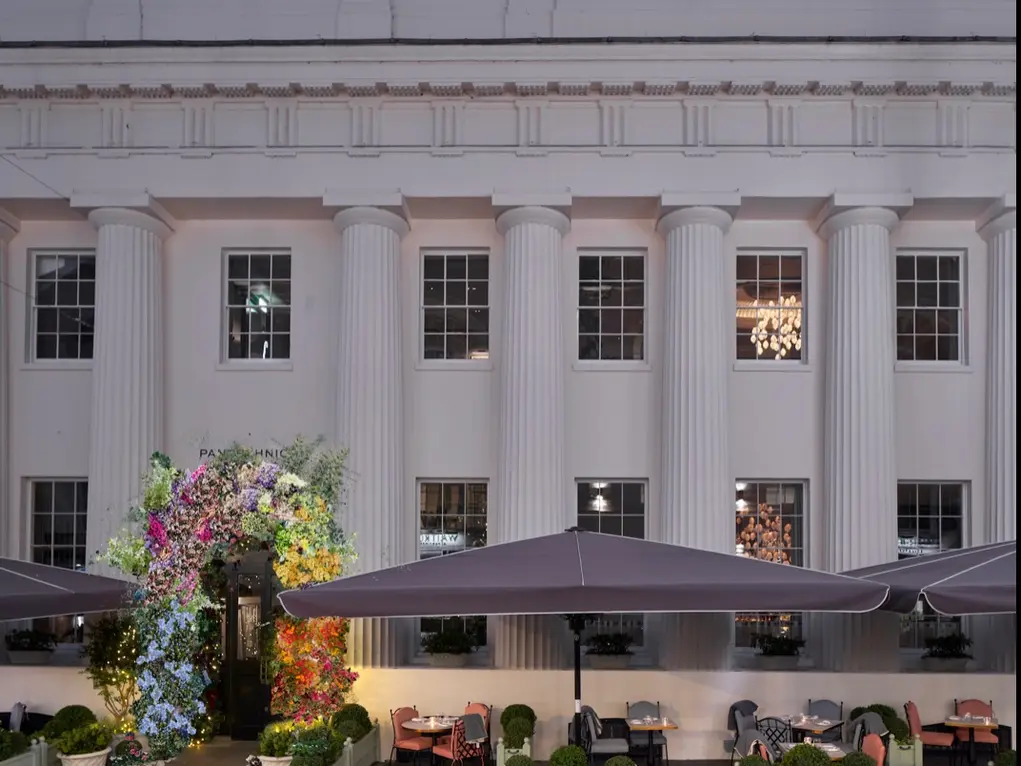 Pantechnicon building with a floral archway