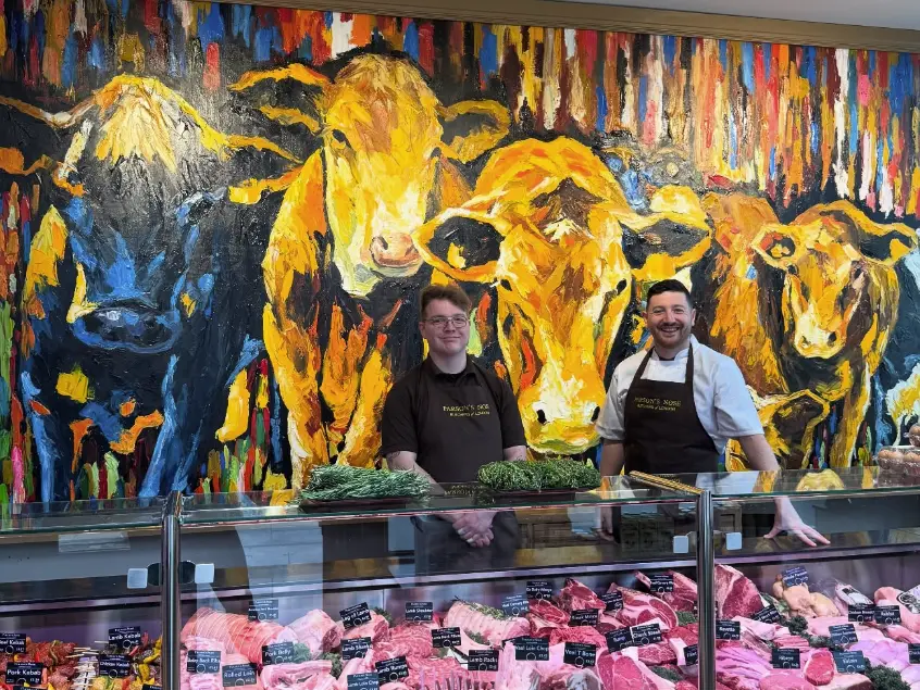 two men in a butchers
