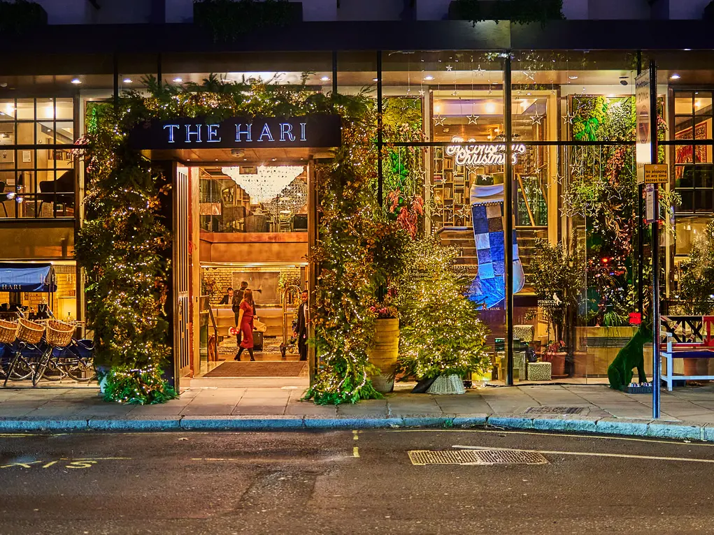 The outside of The Hari hotel decorated with Christmas decorations